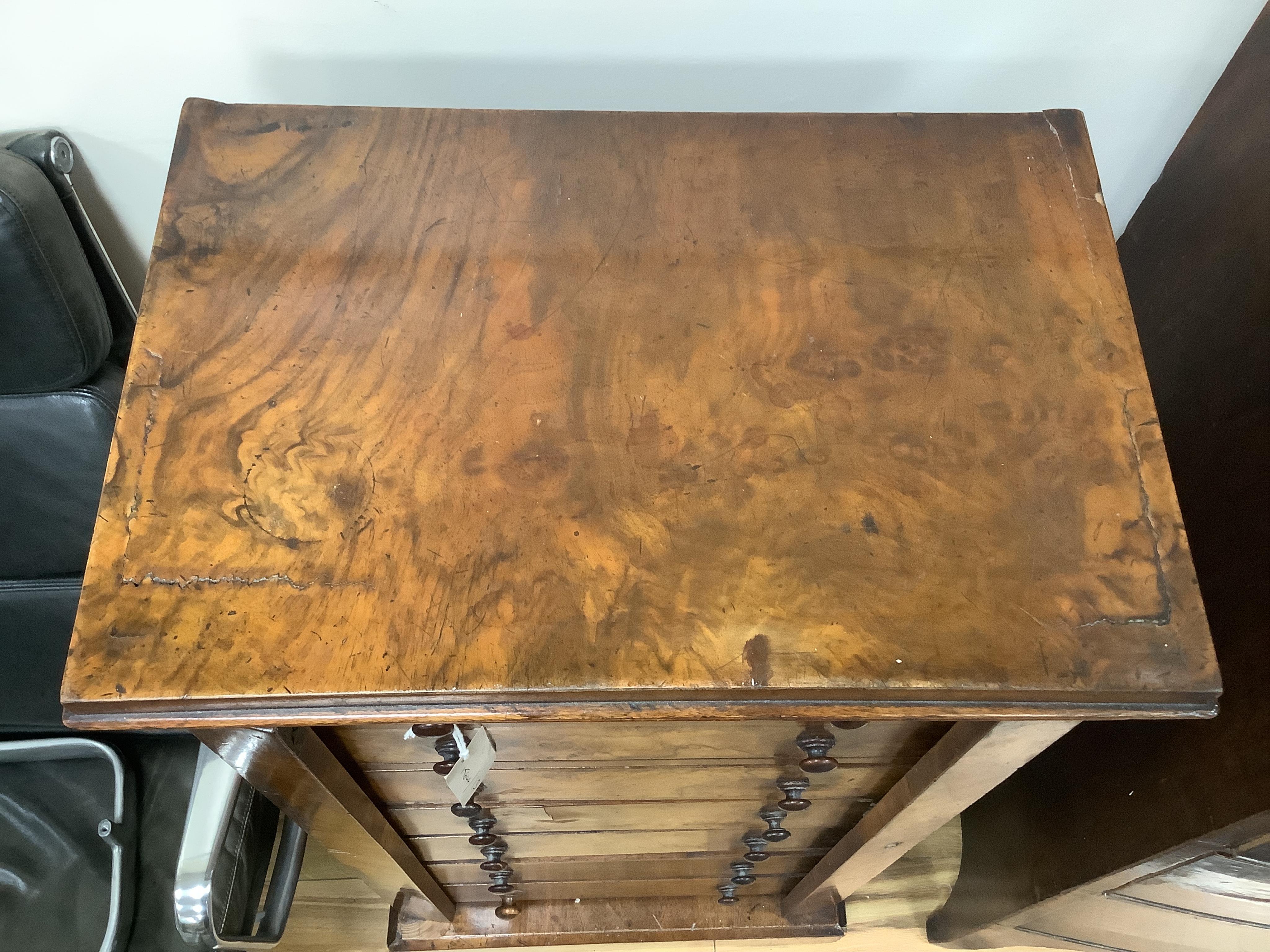 A Victorian figured walnut Wellington chest, width 49cm, depth 33cm, height 98cm. Condition - poor to fair